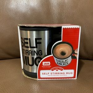 Self stirring mug
